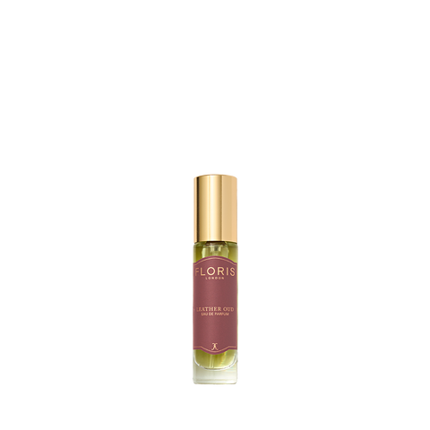 A small Floris London Leather Oud – Eau de Parfum bottle with a gold cap and maroon label, featuring rich oud oil, set against a white background.