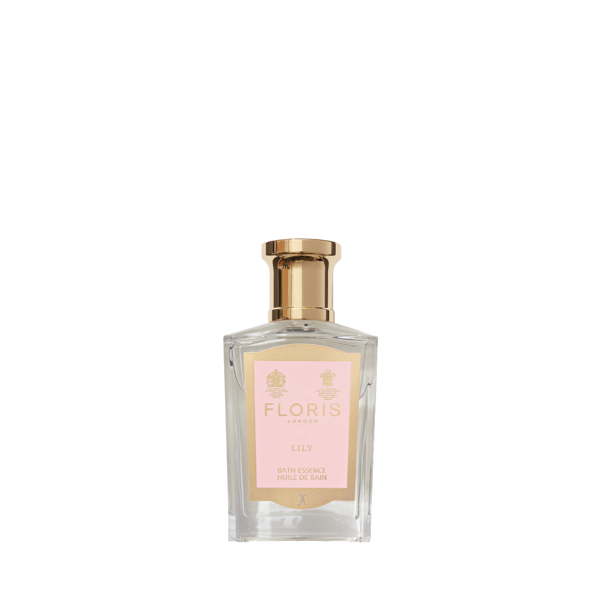A transparent perfume bottle with a gold cap and pink label reads "Floris London Lily - Bath Essence," offering a delicate lily of the valley floral scent.