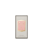 A 50 ml bottle of Floris London Lily Bath Essence, with a pink and gold label and a delicate floral green scent.