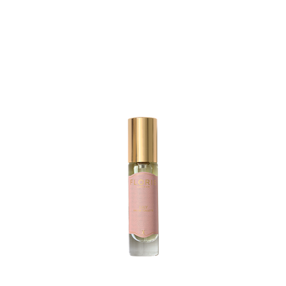 A small Floris London Lily - Eau de Toilette bottle with a pink label and gold cap, featuring a Lily of the Valley scent, on a plain white background.