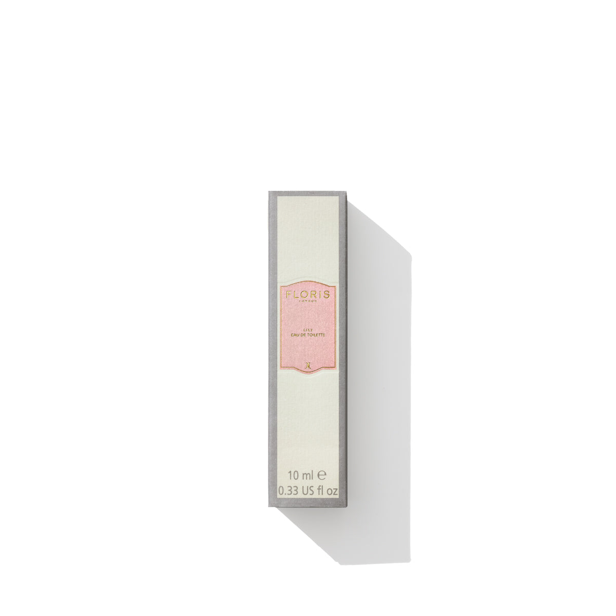 A boxed 10 ml bottle of Floris London Lily Eau de Toilette, featuring a light green label and a pink emblem, offers a delicate floral fragrance with hints of lily of the valley.