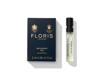 Floris London's Mulberry Fig Eau de Parfum, 2ml, features fig and cardamom notes in a floral amber scent; comes with a navy box adorned with gold text and crests.