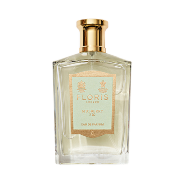 Clear glass bottle of Floris London Mulberry Fig – Eau de Parfum, a fig scent with gold cap, beige label, and refined floral amber fragrance notes.