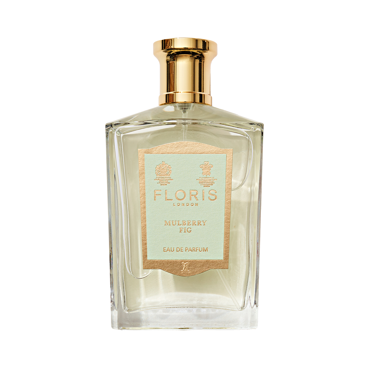 Clear glass perfume bottle with gold cap, labeled "Mulberry Fig - Eau de Parfum" by Floris London, exuding a floral amber fragrance.