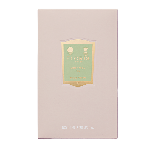 A pale pink 100ml Floris London Mulberry Fig Eau de Parfum box features a gold-green label and offers floral amber scent with elegant woody notes.
