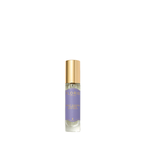 A Floris London Night Scented Jasmine Eau de Toilette with a gold cap and purple label, inspired by jasmine and neroli, sits on a white background.