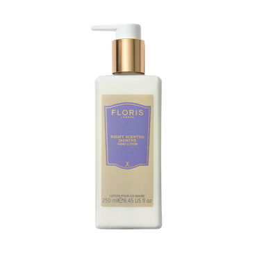 A bottle of Floris London Night Scented Jasmine Luxury Hand Lotion with a gold pump, purple label, vitamin E, and nourishing sweet almond oil.
