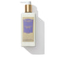 A 250ml bottle of Floris London Night Scented Jasmine Luxury Hand Lotion, featuring a pump dispenser and gold cap, enriched with sweet almond oil to soothe dry skin.