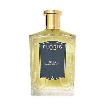 Clear glass bottle of Floris London No. 89 Eau de Toilette, featuring a gold cap and navy blue label—an iconic English fragrance for gentlemen.