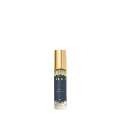 A small Floris London No. 89 Eau de Toilette with a gold cap and dark blue label, ideal as a gentleman's signature fragrance.
