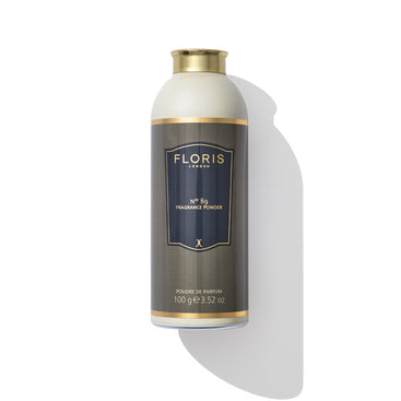 A bottle of Floris London's No. 89 - Fragrance Powder, distinguished by its dark label with gold text and trim, set against a white background.