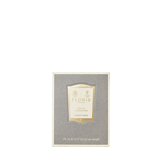 A gray Floris London box labeled "Oud & Cashmere - Room Fragrance," 175ml, sits centered on white—an exotic scent to elevate any space.