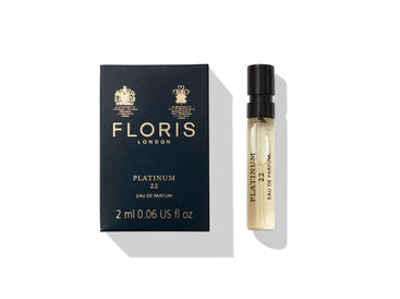 Floris London's Platinum 22 Eau de Parfum, 2ml box and vial, features gold lettering on a dark blue package.