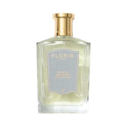 Floris London Purple Mémoire - Eau de Parfum comes in a clear glass bottle with a gold cap and label, radiating classic English charm.