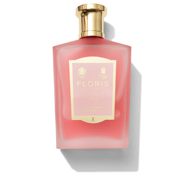 The Red Floris London Rose Mouthwash has a gold cap and rose design label, offering pure rosewater flavor against a white backdrop.