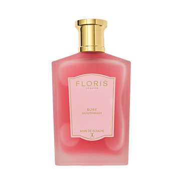 A pink Floris London Rose Mouthwash bottle with a gold cap and a pink-and-gold label.