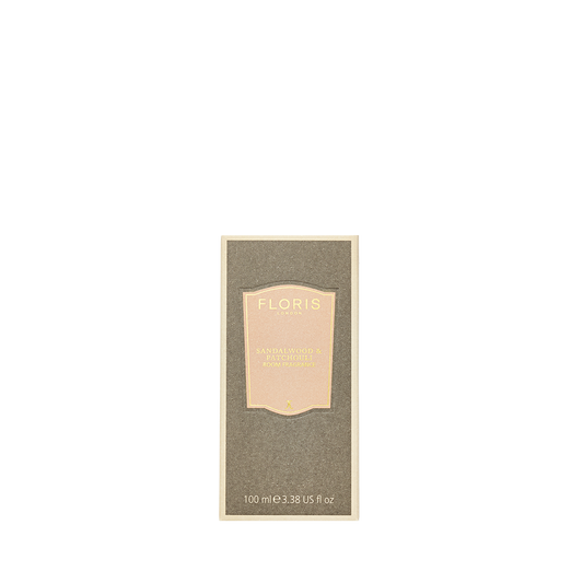 Rectangular Floris London box with a beige label and gold "Sandalwood & Patchouli" lettering suggests a rich, woody amber room fragrance.