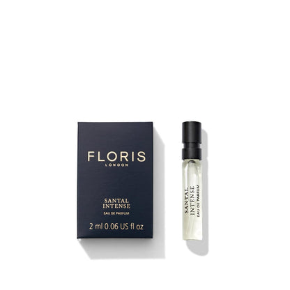 A small black box labeled "Floris London" and a 2 ml spray bottle of Santal Intense - Eau de Parfum, showcasing its luxurious sandalwood fragrance, against a white background.