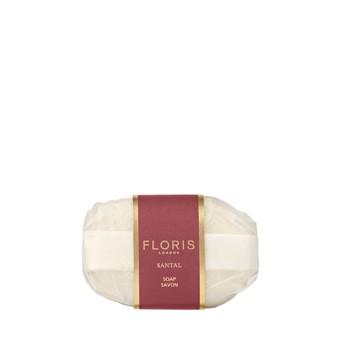 Floris London Santal - Luxury Soap: oval, vegetable-based bar wrapped in white paper, finished with a red and gold Floris Santal label.