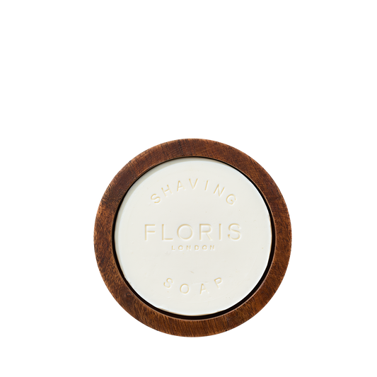 Santal Shaving Soap & Bowl by Floris London, round with shea butter in a wooden bowl, viewed from above on a white background.