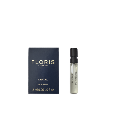 A Floris London Santal - Eau de Toilette sample vial sits next to its navy blue box, both featuring gold and black labels—a refined men’s scent.
