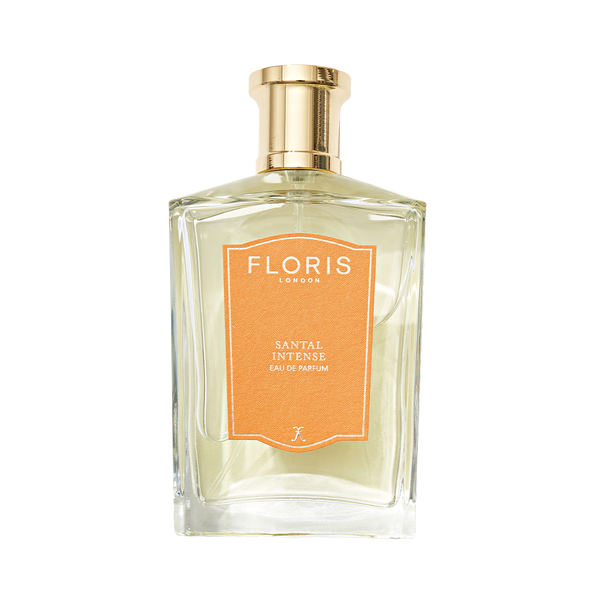Clear perfume bottle labeled "Floris London Santal Intense - Eau de Parfum" with a gold cap, offering a modern sandalwood fragrance.