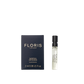 A 2ml sample vial of Floris London Santal Intense Eau de Parfum, shown next to its black and gold box—a contemporary sandalwood fragrance.