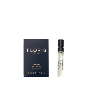 A 2ml sample vial of Floris London Santal Intense Eau de Parfum, shown next to its black and gold box—a contemporary sandalwood fragrance.