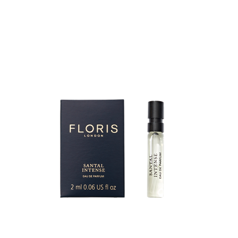 A 2ml sample vial of Floris London Santal Intense Eau de Parfum, shown next to its black and gold box—a contemporary sandalwood fragrance.