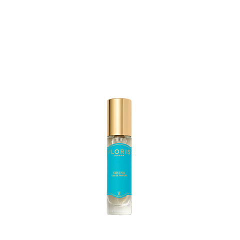 A small perfume bottle with a gold cap and blue label, "Sirena - Eau de Parfum" by Floris London, offers a fresh floral scent with bergamot hints.