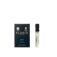 A small vial of Floris London Sirena - Eau de Parfum sits beside its dark blue and gold box, highlighting its fresh floral fragrance.