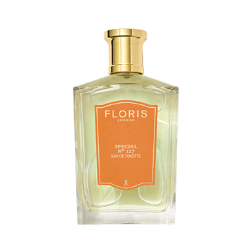 A clear glass bottle of Floris London Special No. 127 Eau de Toilette with a gold cap and orange label.
