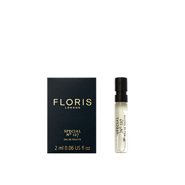 A 2ml Floris London Special No. 127 Eau de Toilette, featuring its black box and bottle on the right—classic citrus-floral elegance, mini-sized.