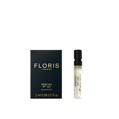 A 2ml Floris London Special No. 127 Eau de Toilette, featuring its black box and bottle on the right—classic citrus-floral elegance, mini-sized.