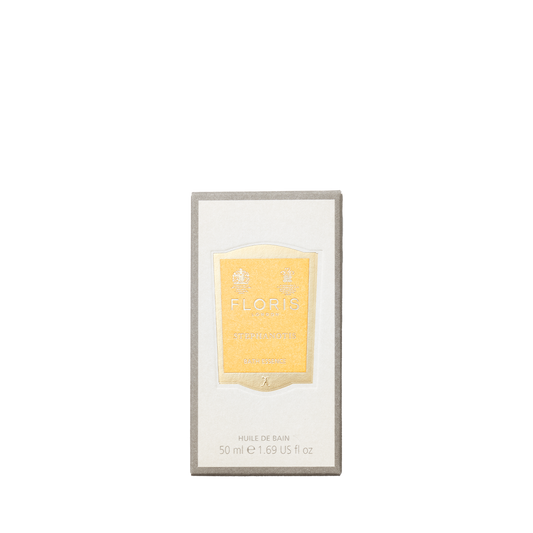 A 50ml Floris London Stephanotis Bath Essence with a yellow label is displayed in its box against a plain white background.
