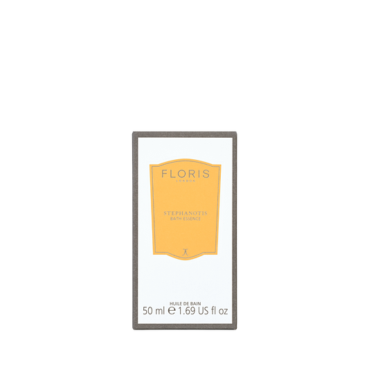A rectangular Floris London Stephanotis - Bath Essence box, yellow label, floral scent text, 50 ml (1.69 US fl oz), on a plain light background.