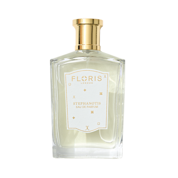 The Floris London Stephanotis - Eau de Parfum | Limited Edition is a clear glass bottle with a gold cap and white label, featuring a lasting floral scent.
