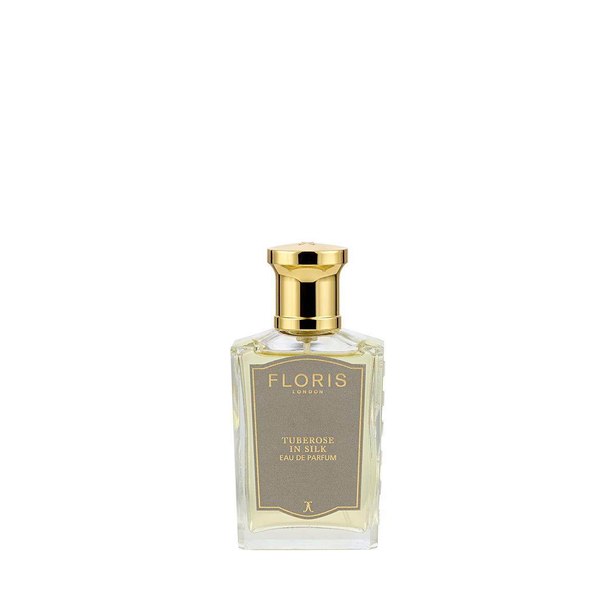 The Floris London Tuberose In Silk Eau de Parfum comes in a glass bottle with a gold cap and label, featuring tuberose and musk notes.