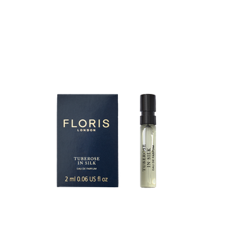 A Floris London Tuberose In Silk - Eau de Parfum sample with navy box and spray vial, featuring notes of tuberose and jasmine.