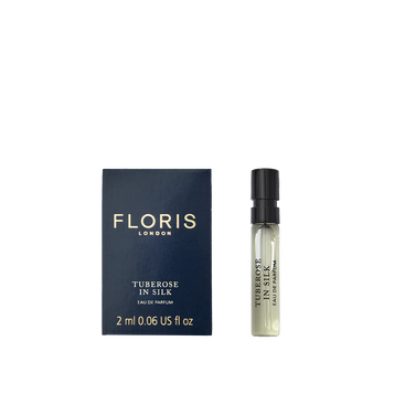 A Floris London Tuberose In Silk - Eau de Parfum sample with navy box and spray vial, featuring notes of tuberose and jasmine.