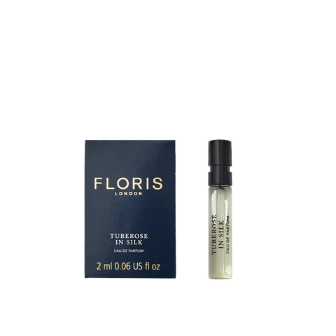 A Floris London Tuberose In Silk - Eau de Parfum sample with navy box and spray vial, featuring notes of tuberose and jasmine.