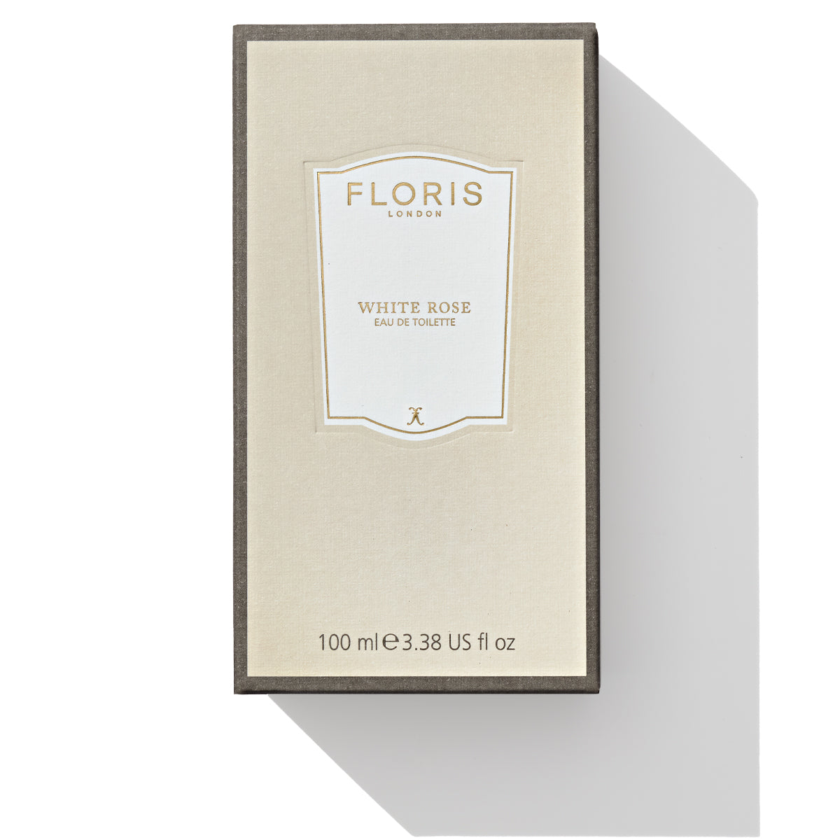 A beige box of Floris London White Rose - Eau de Toilette, 100 ml (3.38 US fl oz), infused with the scent of velvet roses.