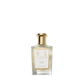 A clear glass bottle of Floris London White Rose - Eau de Toilette, a vegan fragrance, features a gold cap and an elegant white label.