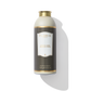 a white bottle with a  grey and white label saying white rose