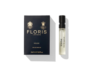 A black "Floris London Wilde - Eau de Parfum" box and a small perfume vial evoke individuality on a white background.