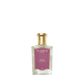 A clear glass bottle of Floris London Wilde Eau de Parfum with a gold cap and purple label, inspired by Oscar Wilde’s creative spirit.