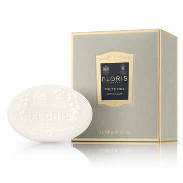 Floris London's White Rose Luxury Soaps 3 x 100g features shea butter and a floral fragrance in elegant packaging with an embossed soap bar.