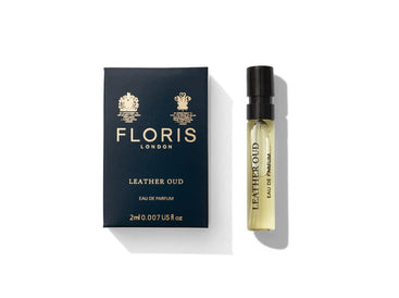 Floris London's Leather Oud Eau de Parfum sample is packaged in a chic blue and gold box, featuring vegan oud oil for a luxurious scent experience.