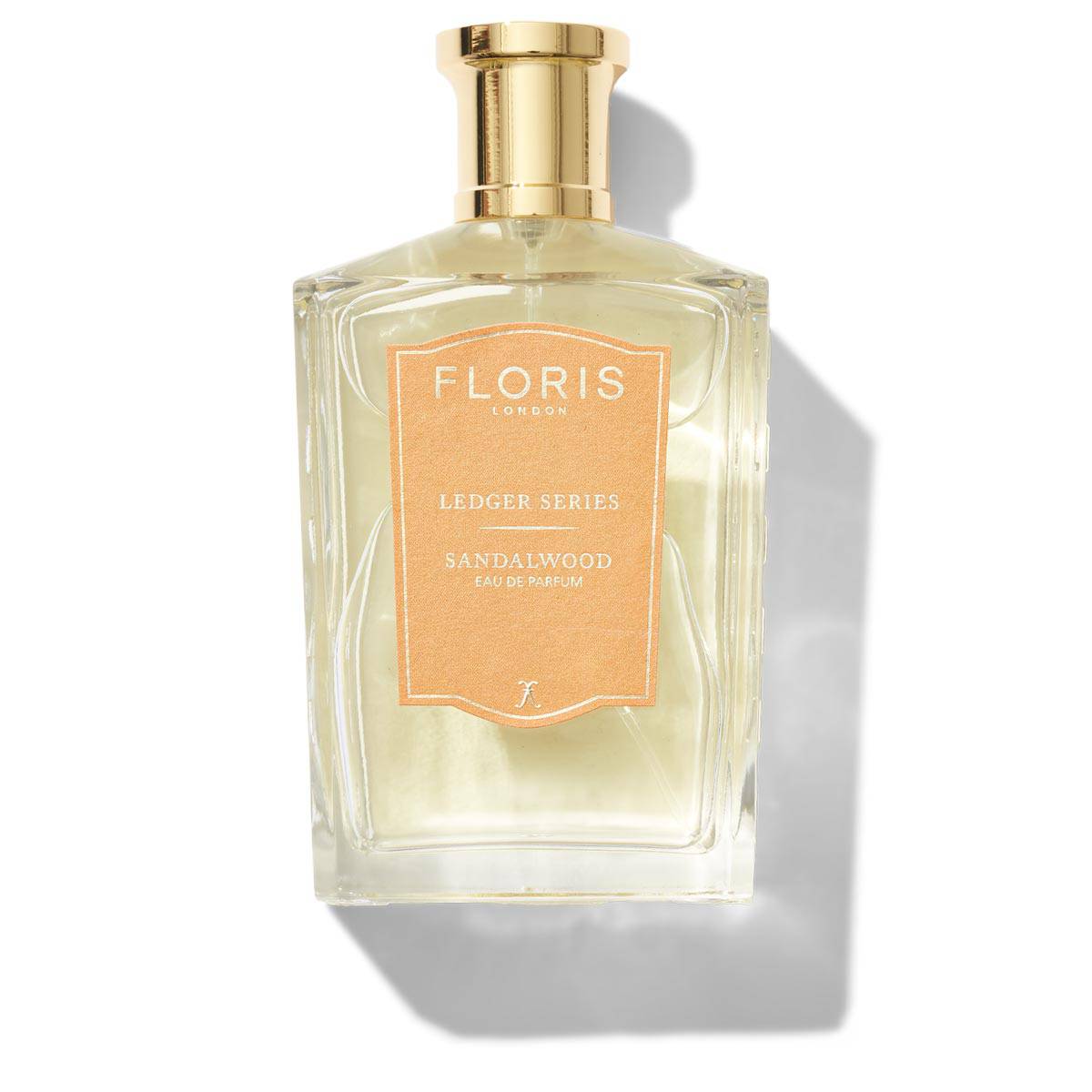 A bottle of Floris London US Sandalwood Eau de Parfum, Ledger Series, 100ml with an orange label.